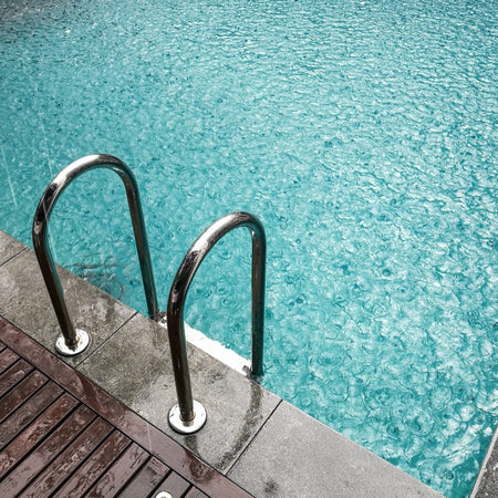 Cleaning Your Swimming Pool After Heavy Rains, Storms, and Strong Winds