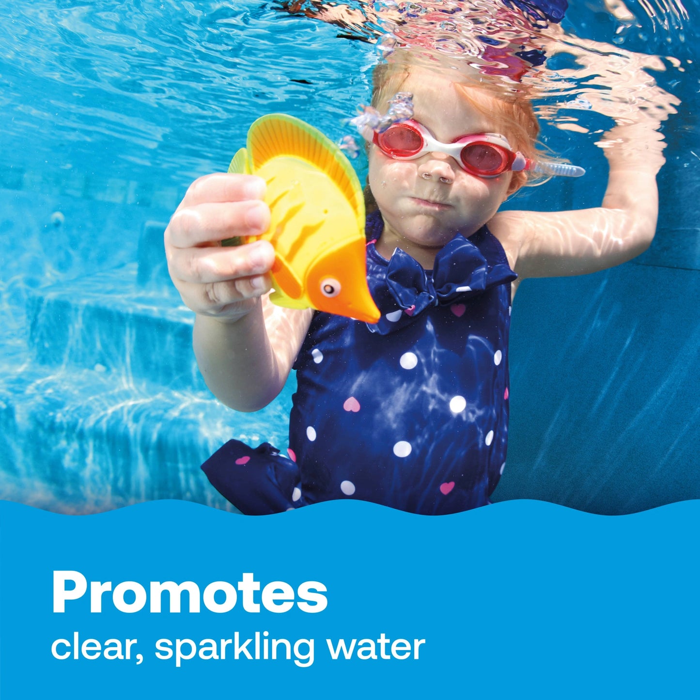 child swims below clear water promise from chlorine tablets