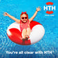 child floats happily in clear balanced pool water