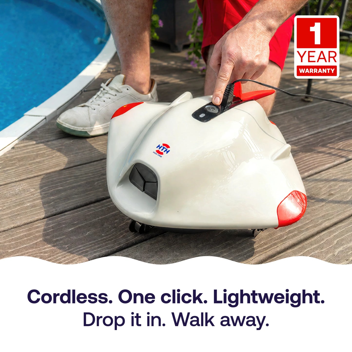 User activating the HTH cordless robotic pool cleaner with one-touch operation before placing it into an above-ground swimming pool.