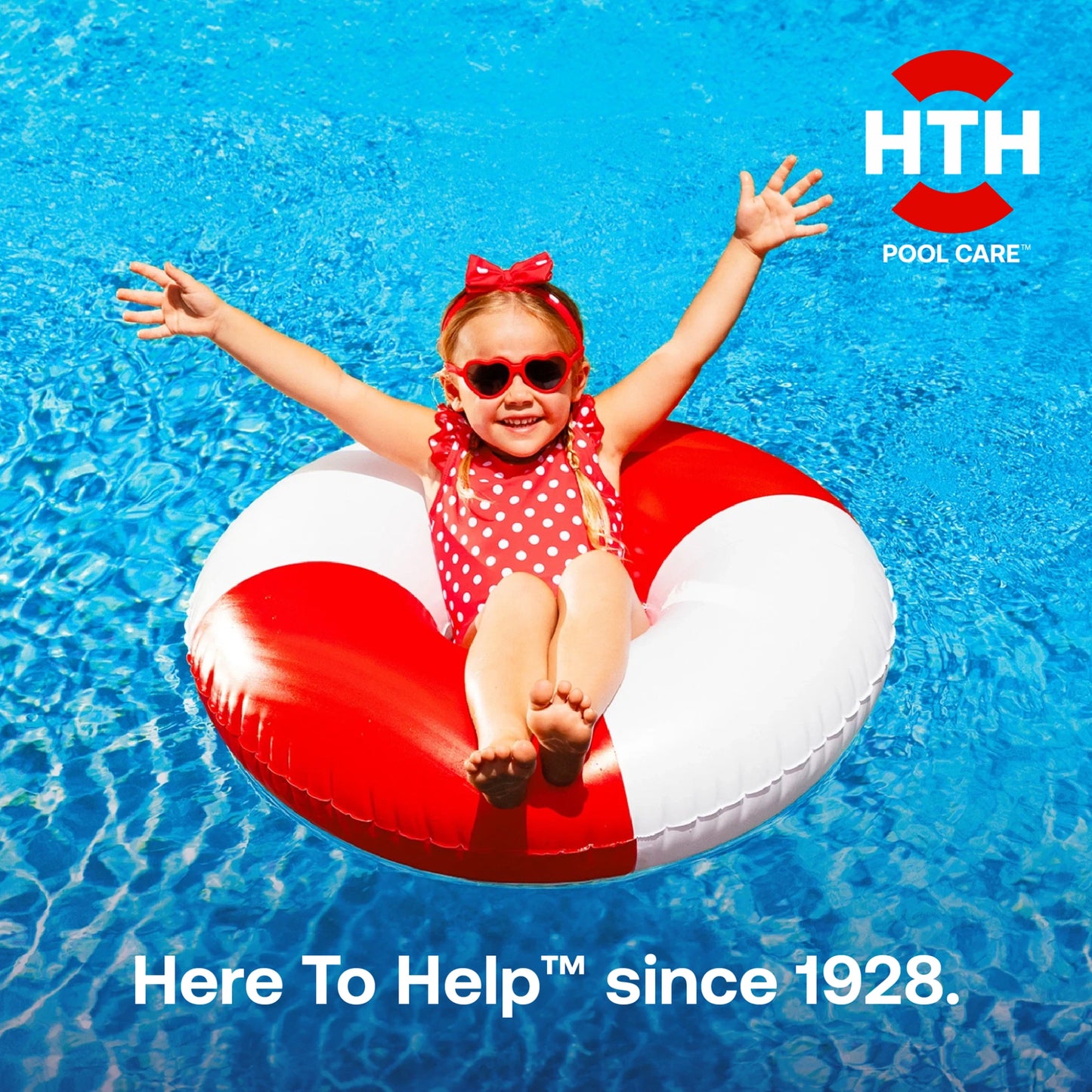 HTH Pool Care lifestyle image featuring a family enjoying a clean crystal clear swimming pool.