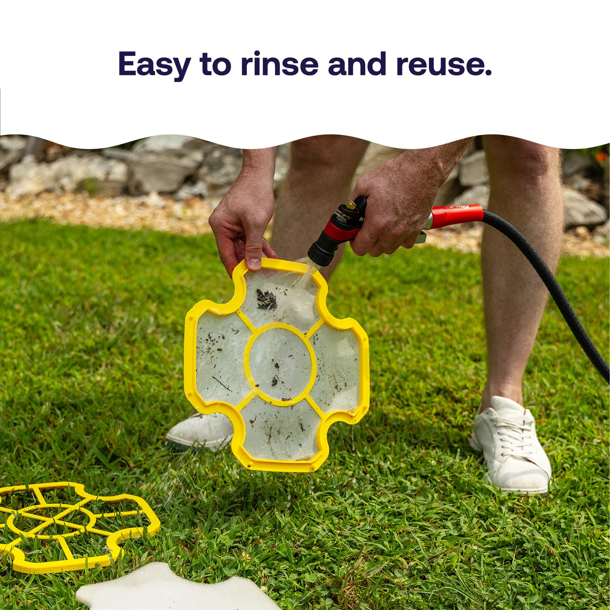 HTH reusable dual-layer pool cleaner filter being rinsed clean with water for fast and easy maintenance between uses.