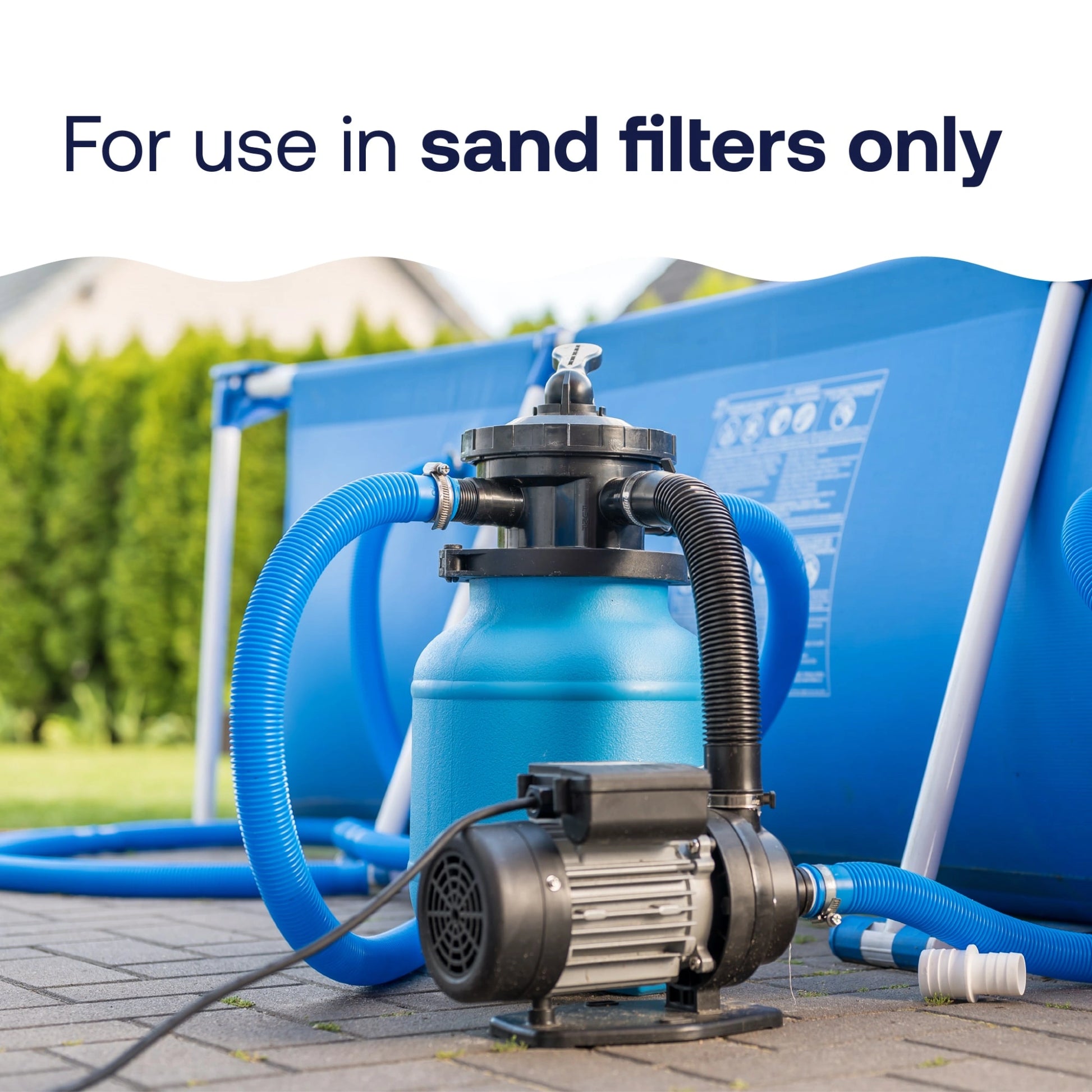 sand filter equipment beside a swimming pool